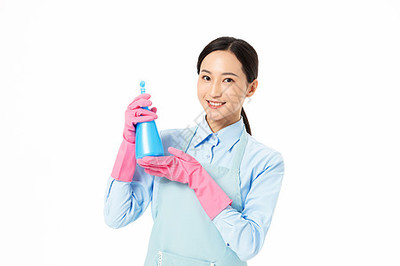 家政服务女性使用洒水器图片素材库-相似素材高清照片501534450